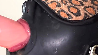 Masked Slut Sucks Dildos