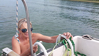 Sexy Granny Swims Naked in a Lake!