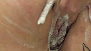 short hair tattooed girl tke a shower and masturbate