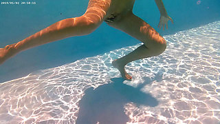 Outdoor sexy nude swimming by exhibitionist girl