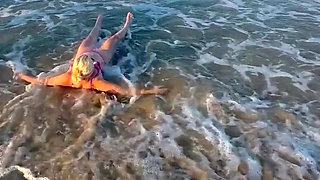 Try Not to Wet My Hair While Play with the Waves