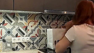 The Juggler Girl Is Here in a Long School Type Uniform Skirt to Flash Her Panties Under Her Miniskirt in the Kitchen