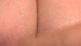 Chic Big Tits Close-up Washing in the Bath. a Mature BBW with Wet Breasts.