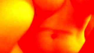 Busty babe playing with her big boobs