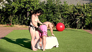 Strapon fucked outside where the neighbors can see
