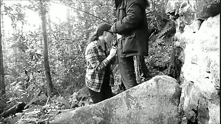 Black and white video of my slutty girlfriend sucking my dick in the forest
