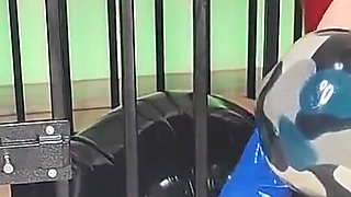 Latex Officer Fucks His Latex Prisoner with a Strap-on