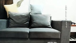 Cute amateur asian web cam girl playing with her toy