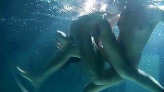 Two delectable and juicy Russian teens undressing in the pool