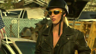 Hot sexual moment in a car demolition...