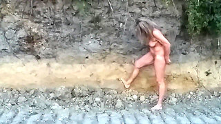 Naked Granny in a Gravel Pit!