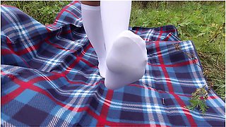 Schoolgirl In Uniform Shows Legs Feet Foot In White Knee Socks And Pantyhose Under Skirt