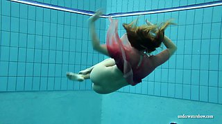 Hot redhead teen cutie underwater looks completely mindblowing