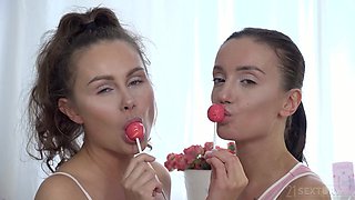 Sweet candy girls enchant with tender, intimate allure