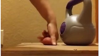 Wife Crushes Balls With Kettle Bells