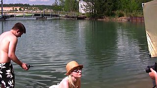 Blonde is flashing her big boobs in the outdoors