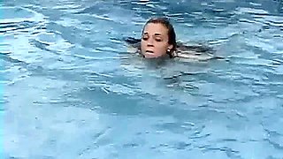 Meche Miley straitjacketed in pool