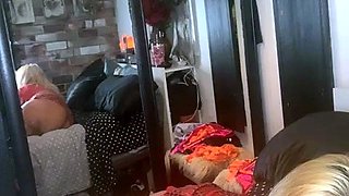 Blonde mature with big boobs masturbates in bed