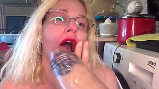 Horny stepmom in latex heels surprises stepson with huge dildo and dirty talk in kitchen