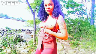 Nude solo babe Boricualovenyc enjoys public fun while camping, flashing her tits and giving a blowjob