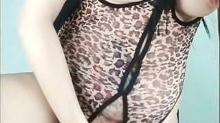 A Thai prostitute in a leopard-print outfit had a dildo inserted into her vagina. RealThaiSolo