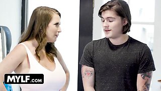Sophia Locke and Kat Marie kneel nude on blue gym mats for oiled MYLF threesome