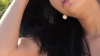 Two hot brunettes rubbing and licking