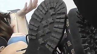 Two Beautiful Chicks Getting Their Feet Worshiped by a Masked Man