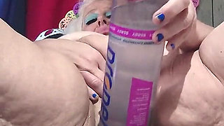 Big Bottle Plugged Clit Cunt