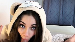 sexy girl in cute bear costume jumps on dick and sucks cock