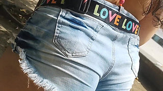 Hot girl showing off in shorts on the street