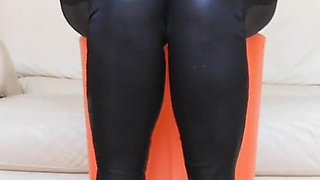 Raven Toe Tapping Crossed Legs with Hight Hells and Latex Pants