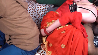 Curvy Desi wife lifts red saree for rough hidden couch sex
