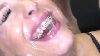 Dark Haired Beauty Gets Her Entire Body Covered in Cum