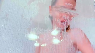 She blows her own mind in the shower while you wank