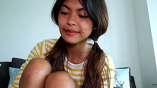 Excited Thai teen gets a big white cock