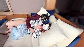 On the Sofa in Their Secret Room, They Shared Passionate Kisses Before Making Love, Expressing Their Deep Love.