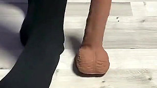 Sexy Dominatrix in Nylon Pantyhose Is Trampling Your Cock