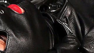 Lady Amber Encases Slave Mila Layers of Leather