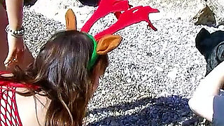 Horny teen and her girlfriend are banged by stepdad on the beach on vacation