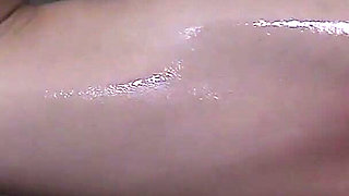 Naked Sportswoman Oils Herself up