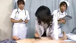 Milf Japan doctor instructs nurses on proper handjob
