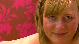 Horny Mature Lady April Rubs Her Pussy on Camera for You