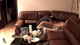 Horny young lovers engage in hot sex action on the couch