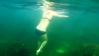 Swimming and Flashing in the Sea