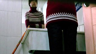 Kneeling toilet pissing asian girl voyeur video