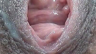 Extreme Close-up of Wet Hairy Vagina with Dildo
