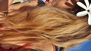 Melissa Johnson Sucks and Licks a Cherry Lollipop on the.beach