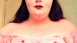 Busty curly brunette with big boobs fucks on couch