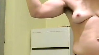 Flexing While Wearing Strapon